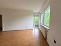 Wohnzimmer mit Zugang zum Balk