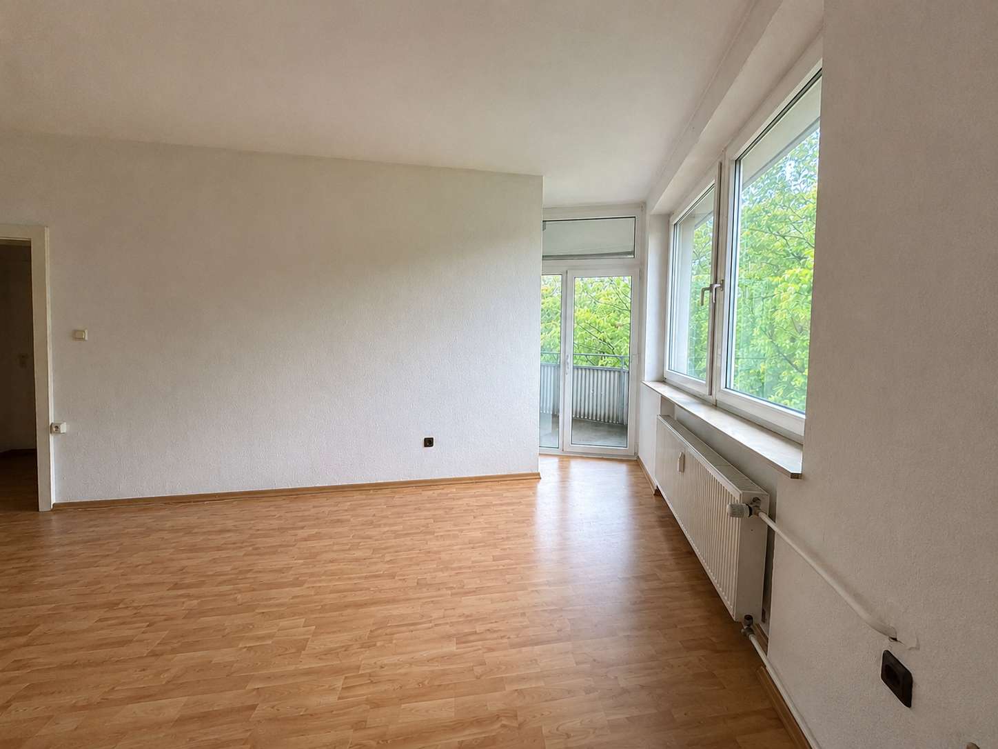 Wohnzimmer mit Zugang zum Balk